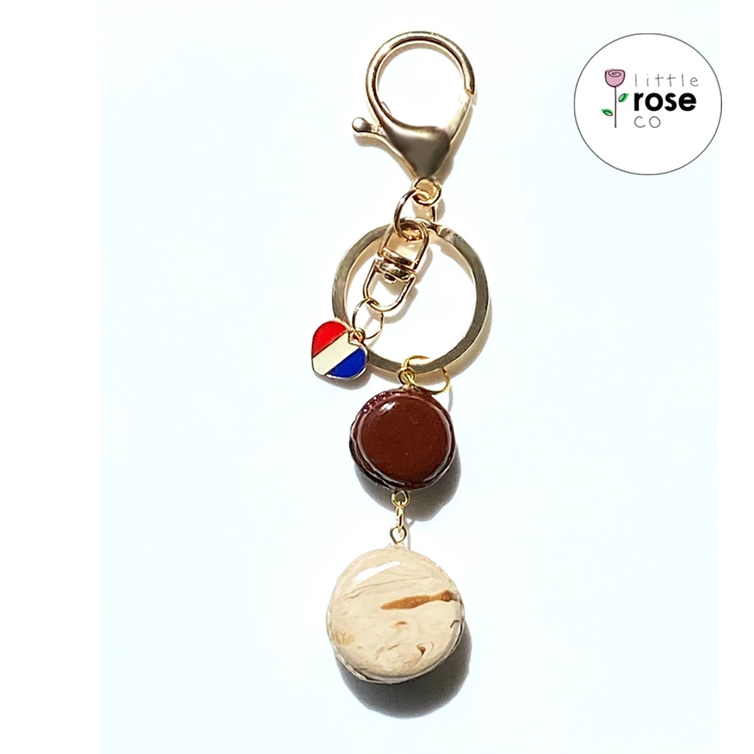 Dark Chocolate & Choc Swirl Macaron Keyring with a French Golden Heart Charm